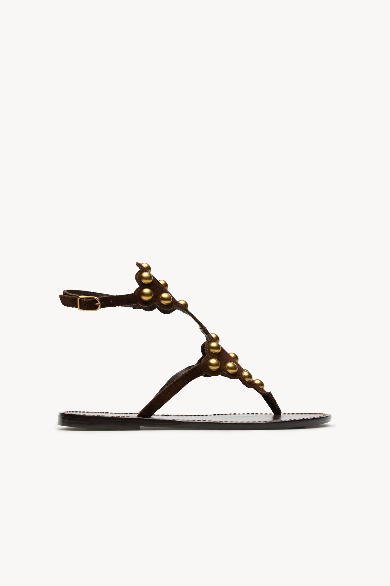 Hoss Intropia Maisa. Sand&aacute;lias com pe&ccedil;as met&aacute;licas em pele