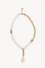 Hoss Intropia Marelin. Collar resina y moneda Beige