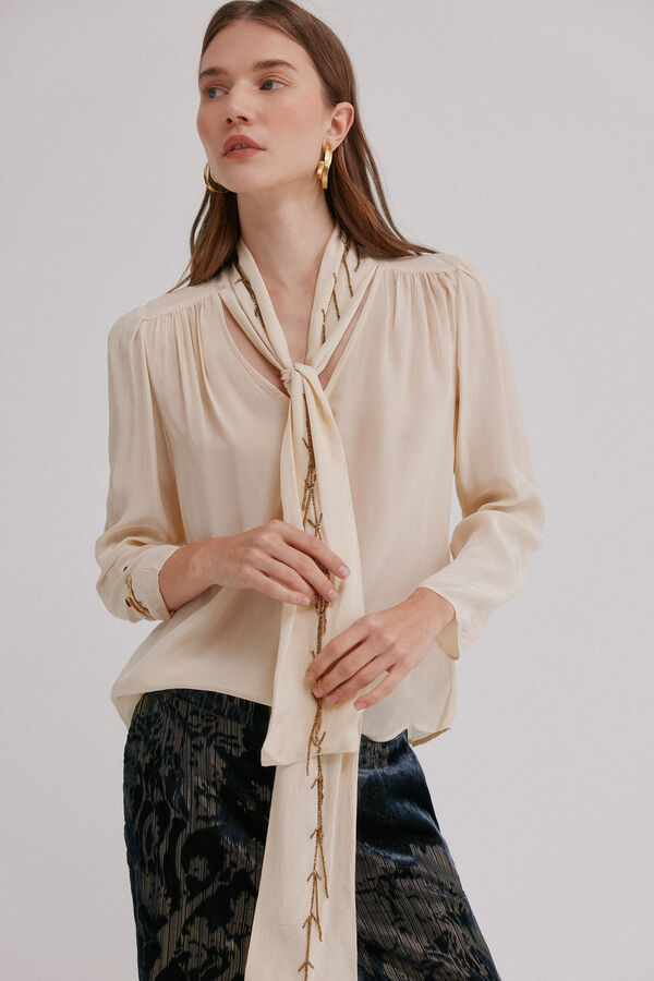 Hoss Intropia Carrie. Blusa con lazada Marfil